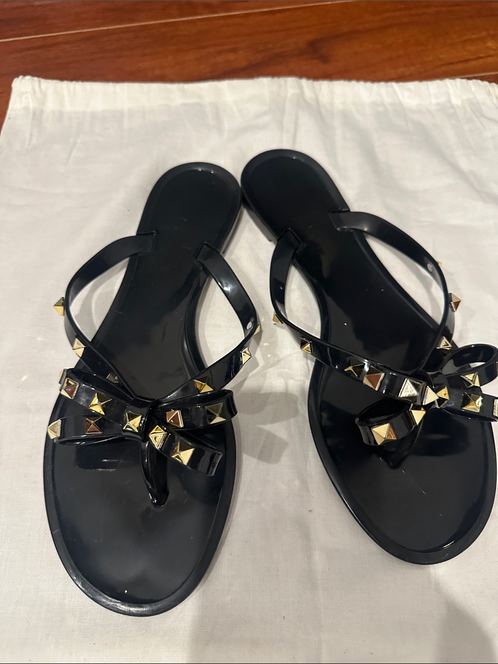 Black Studded Bow Jelly Thong Sandals - Women